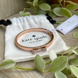 Kate Spade Rose Gold Tone Bangle Bracelet with Rhinestone Bow Accent